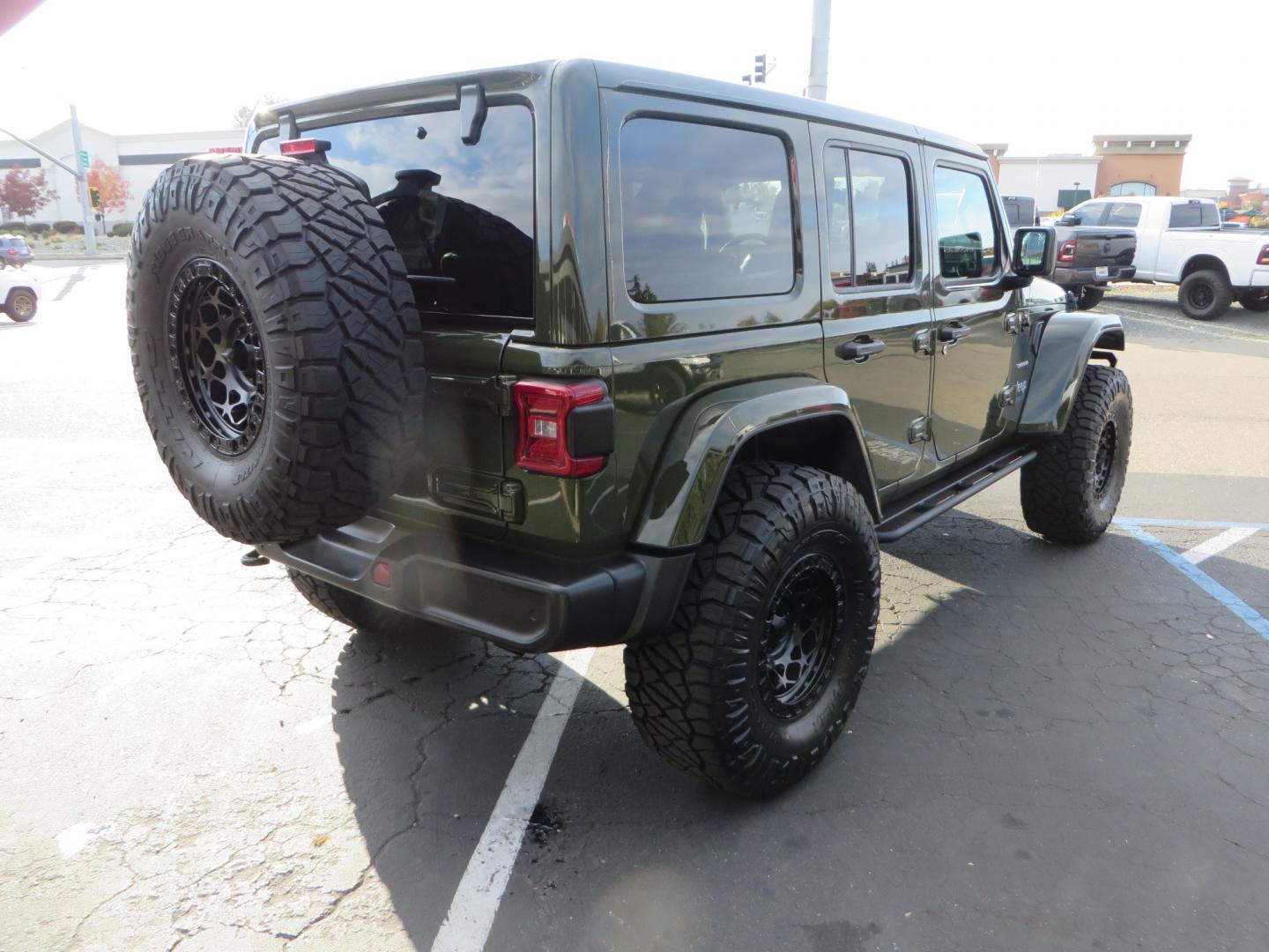 2021 Sarge Green /BLACK Jeep Wrangler Unlimited Sahara 4XE 4d SUV 4wd (1C4JJXP6XMW) with an 2.0L I4 DOHC DI Turbo PHEV engine, 8-speed Automatic transmission, located at 2630 Grass Valley Highway, Auburn, CA, 95603, (530) 508-5100, 38.937893, -121.095482 - 4XE Sahara with a Teraflex suspension system, Falcon shocks, 17" Fuel Offroad wheels, and 37" Nitto Ridge Grappler tires. - Photo#4